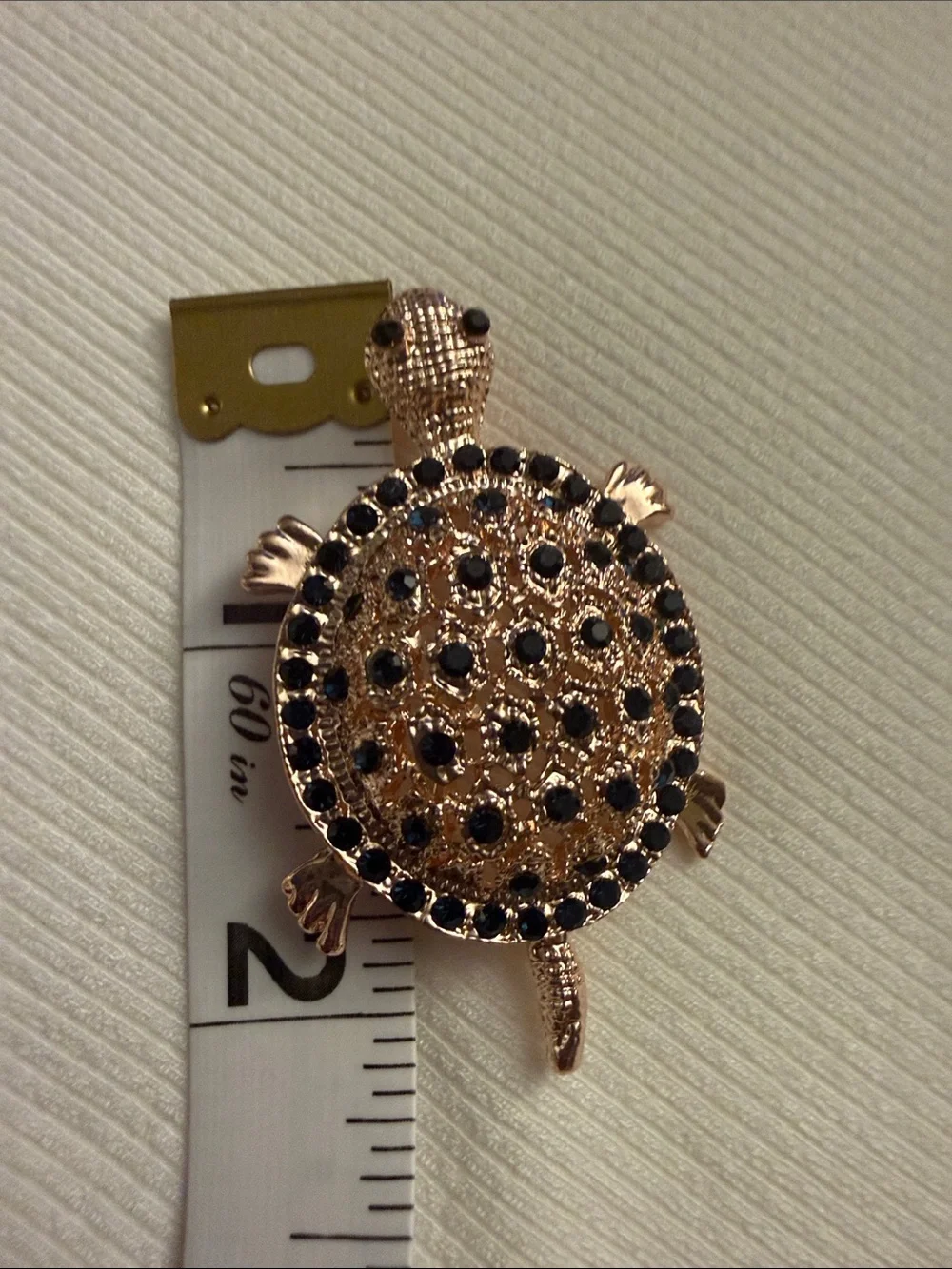 Gold-Tone Turtle Brooch with Black Crystal Accents